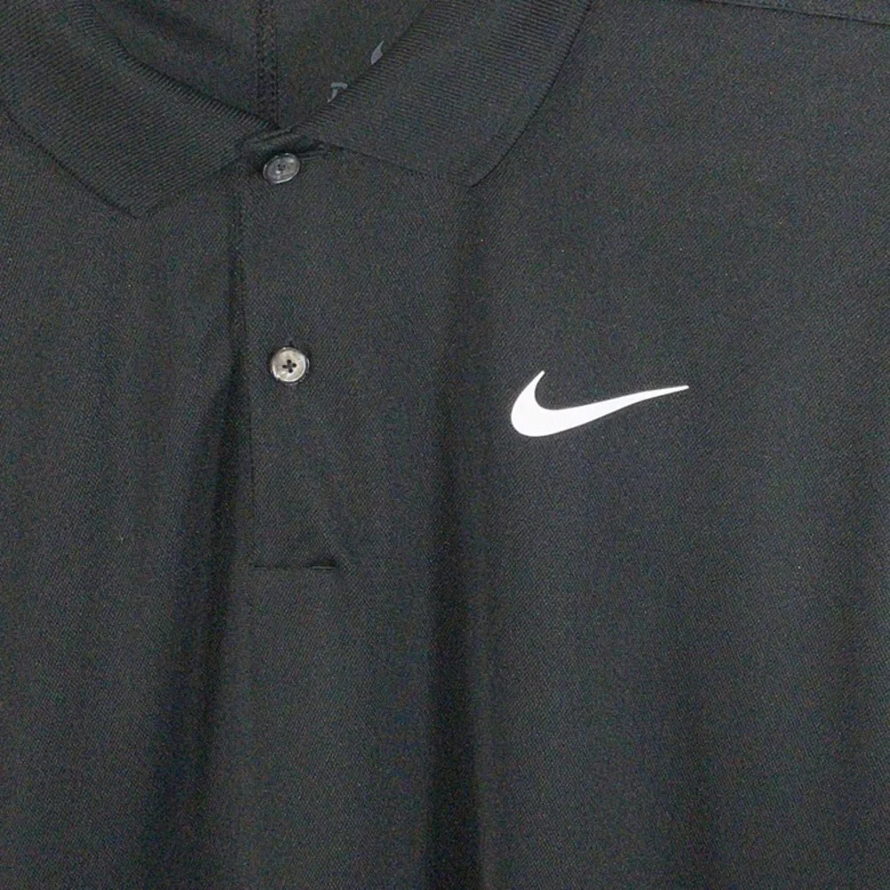 Nike Men's Polo Shirt in Black with White Logo